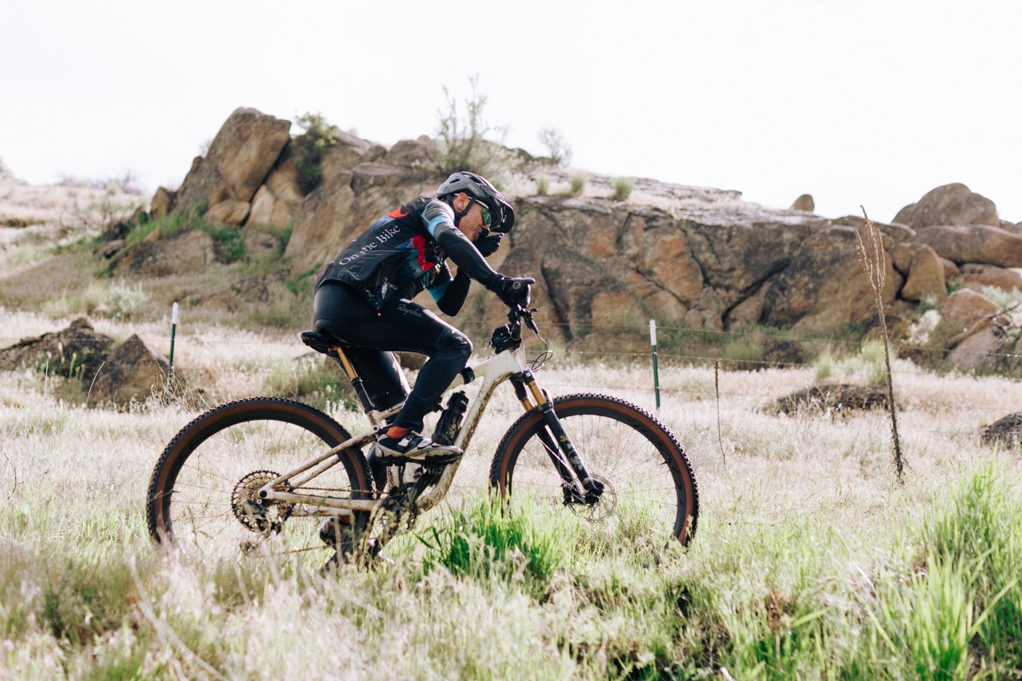 Ben Stein racing a mountain bike.